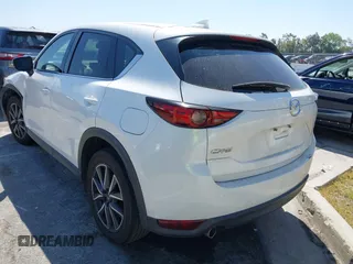 2018 Mazda CX-5 Grand Touring with VIN JM3KFADM8J0373368, listed as a IAAI auction lot 42013535 with 63,142 mi miles and . Bid and sale history available at DreamBid. Image 3.