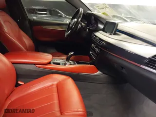 2019 BMW X6 sDrive35i with VIN 5UXKU0C5XK0S97686, listed as a IAAI auction lot 40436492 with 105,584 mi miles. Bid and sale history available at carsss.com. Image 5.