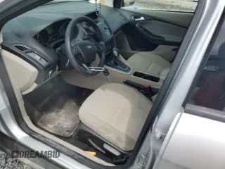 2018 Ford Focus SE z VIN 1FADP3F27JL250591, wystawiony jako Copart lot #54989245 z przebiegiem 85 838 mil mil oraz Szkoda całkowita • Salvage title. Historia ofert i sprzedaży dostępna na DreamBid. Obrazek 7.
