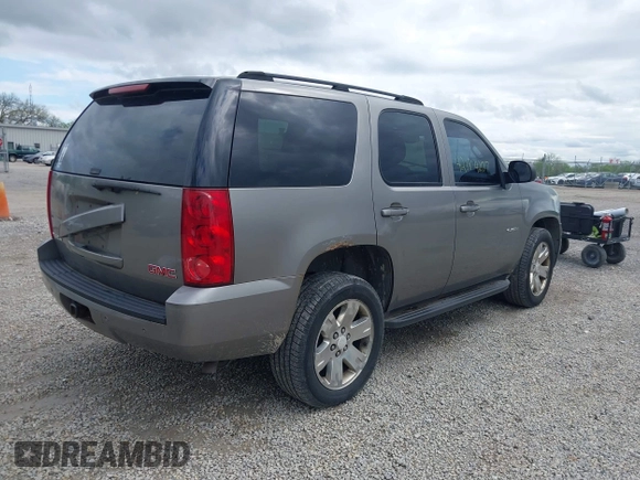 2007 GMC Yukon SLT z VIN 1GKFK13077R129885, wystawiony jako IAAI lot #42184207 z przebiegiem 264 848 mil mil oraz . Historia ofert i sprzedaży dostępna na DreamBid. Obrazek 4.