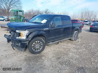 2018 Ford F-150 XL with VIN 1FTEW1EP5JFB66156, listed as a IAAI auction lot 41696600 with 103,901 mi miles. Bid and sale history available at carsss.com. Image 17.