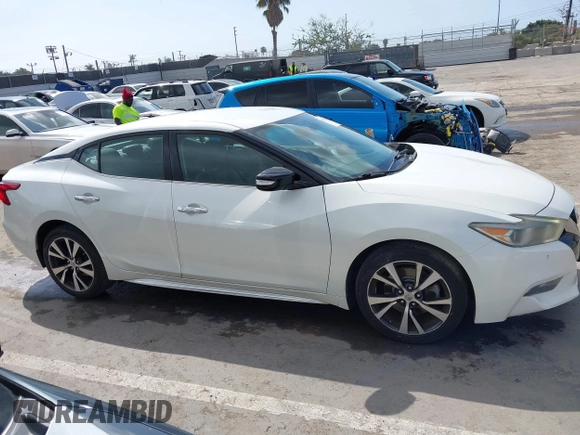 2016 Nissan Maxima S with VIN 1N4AA6AP2GC430689, listed as a IAAI auction lot 41913701 with 132,637 mi miles and . Bid and sale history available at DreamBid. Image 13.