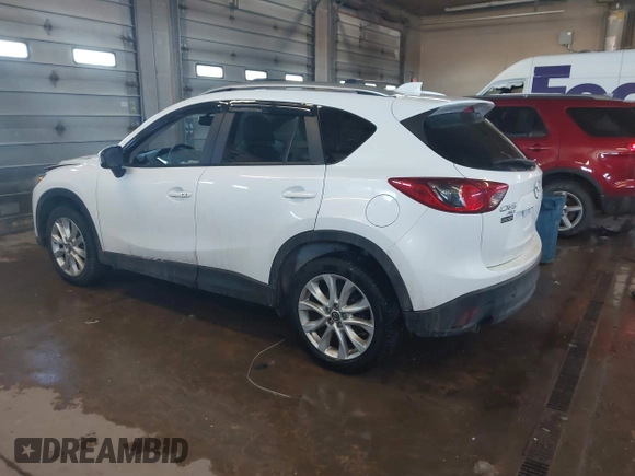 2013 Mazda CX-5 Grand Touring with VIN JM3KE4DE1D0159632, listed as a IAAI auction lot 41524272 with 99,479 mi miles. Bid and sale history available at carsss.com. Image 3.