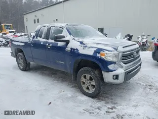 2014 Toyota Tundra 4WD Truck SR with VIN 5TFUY5F18EX392859, listed as a IAAI auction lot 41264709 with 186,881 mi miles. Bid and sale history available at carsss.com. Image 1.
