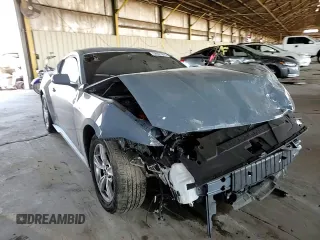 2024 Ford Mustang EcoBoost with VIN 1FA6P8TH8R5122598, listed as a Copart auction lot 58627015 with 15,557 mi miles and Salvage title. Bid and sale history available at DreamBid. Image 13.