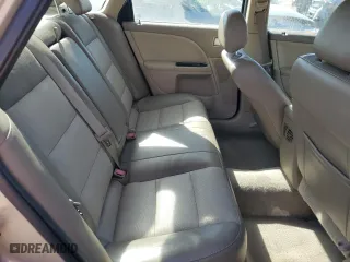 2006 Mercury Montego Premier with VIN 1MEHM421X6G617781, listed as a Copart auction lot 74932874 with 111,105 mi miles and Salvage Title. Bid and sale history available at carsss.com. Image 10.