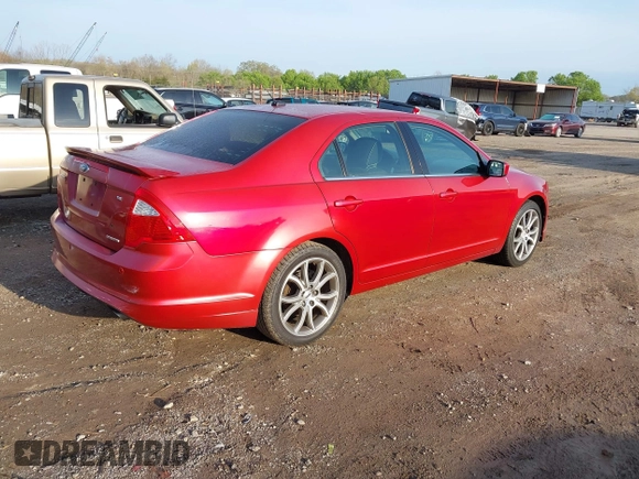 2011 Ford Fusion SE with VIN 3FAHP0HGXBR199597, listed as a IAAI auction lot 41950604 with 184,668 mi miles. Bid and sale history available at carsss.com. Image 4.
