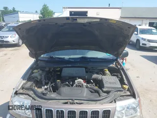 2002 Jeep Grand Cherokee Limited z VIN 1J8GW58N62C213751, wystawiony jako IAAI lot #42478869 z przebiegiem 233 848 mil mil oraz . Historia ofert i sprzedaży dostępna na DreamBid. Obrazek 10.