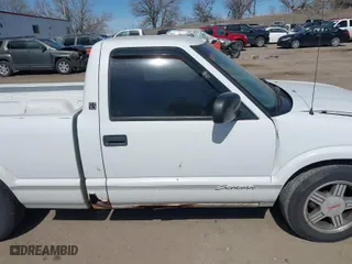 1998 GMC Sonoma with VIN 1GTCS1443W8543587, listed as a IAAI auction lot 41810870 with 164,342 mi miles. Bid and sale history available at carsss.com. Image 13.