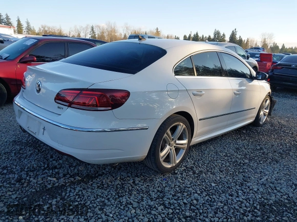 2014 Volkswagen CC Sport with VIN WVWAP7AN1EE540051, listed as a IAAI auction lot 41381933 with 54,896 mi miles. Bid and sale history available at carsss.com. Image 4.