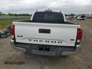 2019 Toyota Tacoma SR z VIN 3TMCZ5AN5KM242521, wystawiony jako Copart lot #55167485 z przebiegiem Nie podano mil oraz Szkoda całkowita • Salvage title. Historia ofert i sprzedaży dostępna na DreamBid. Obrazek 6.