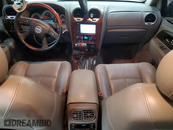 2006 GMC Envoy Denali with VIN 1GKES63MX62284983, listed as a Copart auction lot 73487134 with 134,882 mi miles and Clean Title. Bid and sale history available at carsss.com. Image 8.