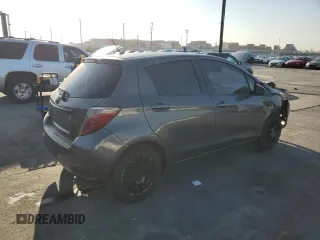 2012 Toyota Yaris L z VIN JTDKTUD33CD541021, wystawiony jako Copart lot #49515845 z przebiegiem 69 122 mil mil oraz Szkoda całkowita • Salvage title. Historia ofert i sprzedaży dostępna na DreamBid. Obrazek 3.