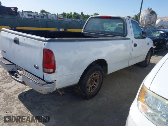 1999 Ford F-150 with VIN 1FTZF172XXNB31548, listed as a IAAI auction lot 42566104 with Not provided miles and . Bid and sale history available at DreamBid. Image 4.