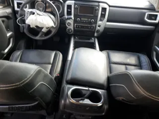 2019 Nissan Titan Pro-4X z VIN 1N6AA1E51KN526104, wystawiony jako Copart lot #51694335 z przebiegiem 56 620 mil mil oraz Szkoda całkowita • Salvage title. Historia ofert i sprzedaży dostępna na DreamBid. Obrazek 8.
