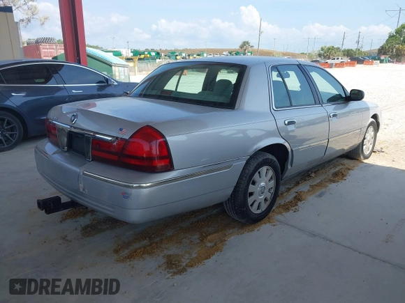 2003 Mercury Grand Marquis LS Premium z VIN 2MEFM75W83X631023, wystawiony jako IAAI lot #42227245 z przebiegiem 114 235 mil mil oraz . Historia ofert i sprzedaży dostępna na DreamBid. Obrazek 4.