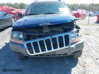 2001 Jeep Grand Cherokee Laredo with VIN 1J4GW48S91C721227, listed as a IAAI auction lot 41792524 with 229,973 mi miles. Bid and sale history available at carsss.com. Image 12.