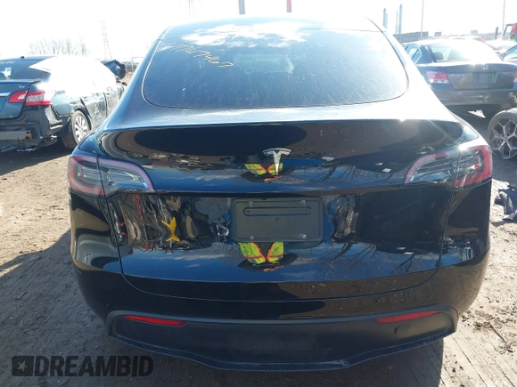2024 Tesla Model Y with VIN 7SAYGDED5RF093018, listed as a IAAI auction lot 41747467 with 60,469 mi miles and . Bid and sale history available at DreamBid. Image 16.