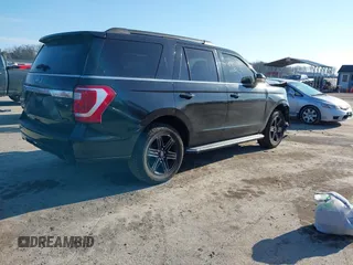 2021 Ford Expedition XLT with VIN 1FMJU1JT9MEA21621, listed as a IAAI auction lot 41458176 with 97,133 mi miles. Bid and sale history available at carsss.com. Image 4.