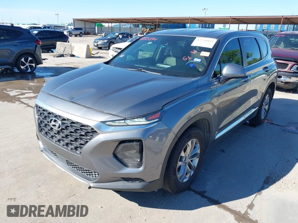 2019 Hyundai Santa Fe SE z VIN 5NMS23AD9KH037539, wystawiony jako IAAI lot #42221894 z przebiegiem 87 755 mil mil oraz . Historia ofert i sprzedaży dostępna na DreamBid. Obrazek 19.