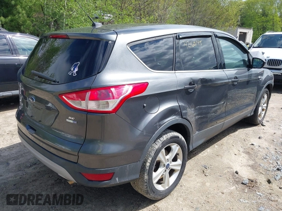 2016 Ford Escape SE z VIN 1FMCU9GX2GUA47702, wystawiony jako IAAI lot #42160145 z przebiegiem 90 765 mil mil oraz . Historia ofert i sprzedaży dostępna na DreamBid. Obrazek 4.