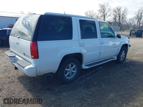 1999 Cadillac Escalade with VIN 1GYEK13R0XR415674, listed as a IAAI auction lot 40003144 with 80,959 mi miles and . Bid and sale history available at DreamBid. Image 4.