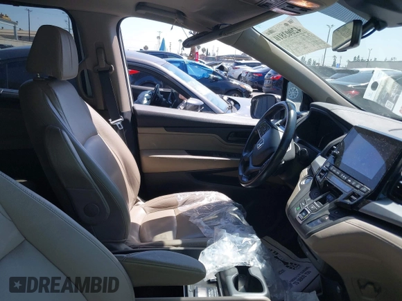 2020 Honda Odyssey Touring with VIN 5FNRL6H81LB028083, listed as a IAAI auction lot 42003810 with 71,536 mi miles and . Bid and sale history available at DreamBid. Image 5.