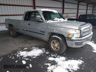 2000 Dodge Ram 2500 with VIN 1B7KC2361YJ127325, listed as a IAAI auction lot 41981547 with 165,410 mi miles. Bid and sale history available at carsss.com. Image 1.