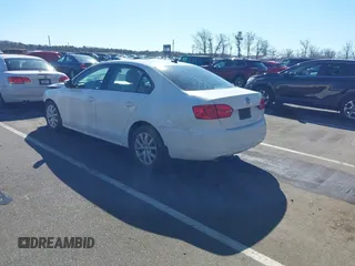 2012 Volkswagen Jetta Sedan SE w/Convenience PZEV with VIN 3VWDP7AJ2CM374783, listed as a IAAI auction lot 41636257 with 124,458 mi miles. Bid and sale history available at carsss.com. Image 3.