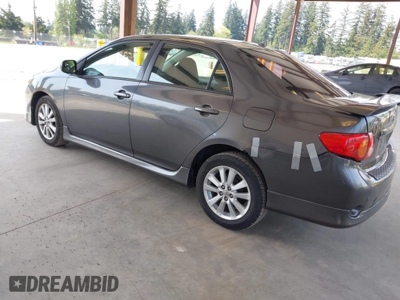 2009 Toyota Corolla with VIN 1NXBU40E79Z133873, listed as a IAAI auction lot 42132035 with 232,578 mi miles. Bid and sale history available at carsss.com. Image 3.