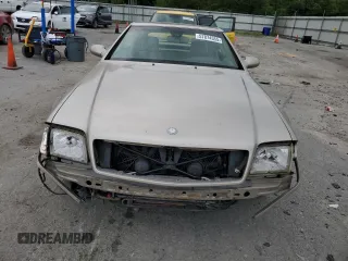 1999 Mercedes-Benz SL 500 z VIN WDBFA68F4XF184352, wystawiony jako Copart lot #57874355 z przebiegiem 215 118 mil mil oraz Tytuł czysty. Historia ofert i sprzedaży dostępna na DreamBid. Obrazek 5.