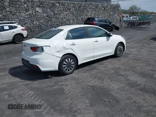 2019 Kia Rio S with VIN 3KPA24AB9KE214579, listed as a IAAI auction lot 41764485 with 82,231 mi miles. Bid and sale history available at carsss.com. Image 4.