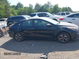 2020 Kia Forte LXS z VIN 3KPF24AD4LE171018, wystawiony jako IAAI lot #42130798 z przebiegiem 206 004 mil mil oraz . Historia ofert i sprzedaży dostępna na DreamBid. Obrazek 12.