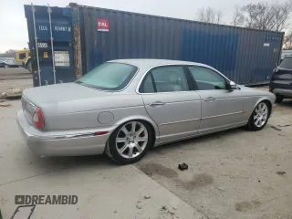 2004 Jaguar XJ with VIN SAJEA74C64SG08121, listed as a Copart auction lot 81736984 with 100,144 mi miles and Non Repairable. Bid and sale history available at DreamBid. Image 3.