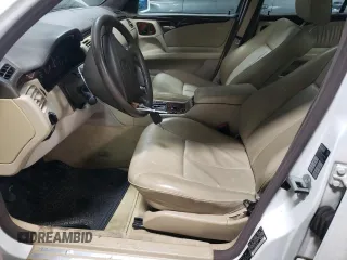 1997 Mercedes-Benz E-Class with VIN WDBJF72F6VA263199, listed as a Copart auction lot 43445715 with 121,444 mi miles and Salvage Title. Bid and sale history available at carsss.com. Image 7.