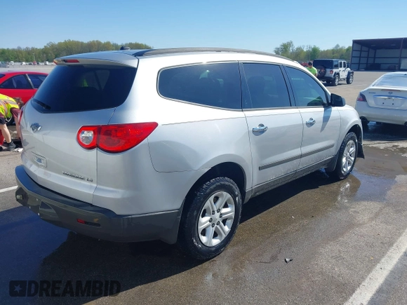 2012 Chevrolet Traverse LS with VIN 1GNKRFED0CJ405987, listed as a IAAI auction lot 42073525 with 162,300 mi miles and . Bid and sale history available at DreamBid. Image 4.