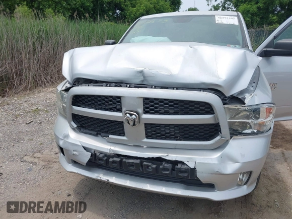 2015 Ram 1500 Express with VIN 1C6RR7KTXFS599751, listed as a IAAI auction lot 42372393 with 103,289 mi miles and . Bid and sale history available at DreamBid. Image 6.