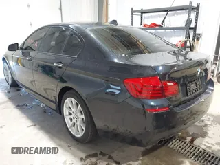 2014 BMW 5 Series 535i xDrive with VIN WBA5B3C58ED531825, listed as a IAAI auction lot 41715275 with 67,782 mi miles and . Bid and sale history available at carsss.com. Image 3.
