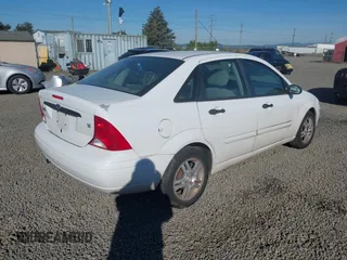 2001 Ford Focus SE with VIN 1FAFP34P21W279390, listed as a IAAI auction lot 42181178 with 123,580 mi miles and . Bid and sale history available at carsss.com. Image 4.