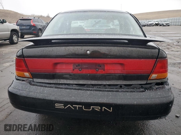 1996 Saturn SL с VIN 1G8ZK5276TZ240883, выставлен на аукционе Copart как лот 84172554 с пробегом 69 820 миль миль и Списание • Salvage title. История ставок и продаж доступна на DreamBid. Изображение 6.