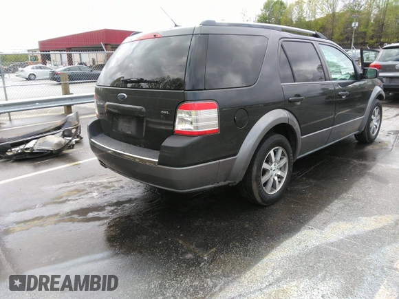 2008 Ford Taurus X SEL z VIN 1FMDK02W08GA28649, wystawiony jako IAAI lot #42026925 z przebiegiem 191 857 mil mil oraz . Historia ofert i sprzedaży dostępna na DreamBid. Obrazek 4.