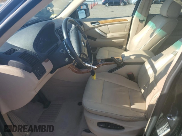 2003 BMW X5 3.0i with VIN 5UXFA53563LV96891, listed as a Copart auction lot 77636084 with 0 mi miles and Salvage Title. Bid and sale history available at carsss.com. Image 7.