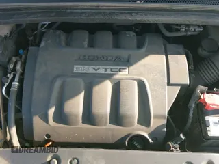 2005 Honda Odyssey LX with VIN 5FNRL38275B040929, listed as a IAAI auction lot 42954319 with 123,979 mi miles and . Bid and sale history available at DreamBid. Image 13.