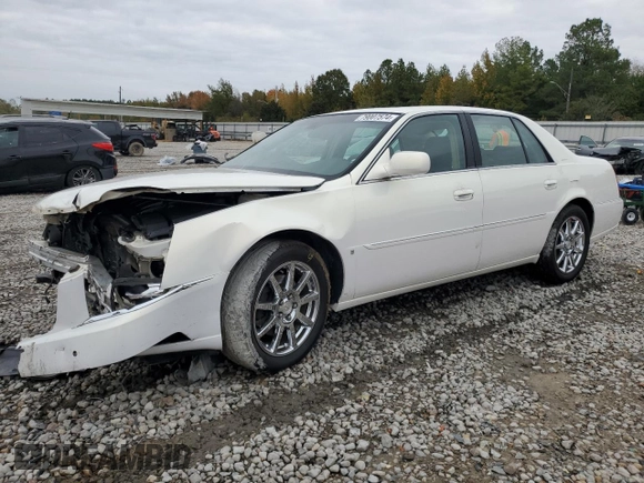 2007 Cadillac DTS Performance z VIN 1G6KD57907U171271, wystawiony jako Copart lot #79007574 z przebiegiem 147 504 mil mil oraz Szkoda całkowita • Salvage title. Historia ofert i sprzedaży dostępna na DreamBid. Obrazek 1.