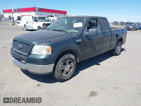 2005 Ford F-150 XLT with VIN 1FTPX12585FA60086, listed as a IAAI auction lot 41859864 with 115,448 mi miles. Bid and sale history available at carsss.com. Image 2.
