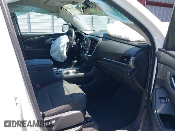 2020 Chevrolet Traverse LS with VIN 1GNERFKW8LJ321354, listed as a IAAI auction lot 42223452 with 52,499 mi miles and . Bid and sale history available at DreamBid. Image 5.
