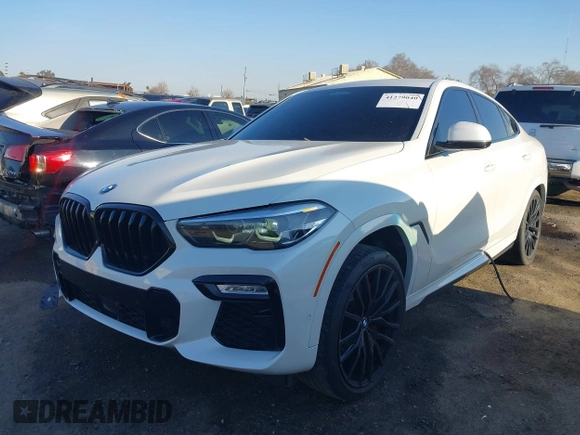 2021 BMW X6 sDrive40i z VIN 5UXCY4C06M9E16162, wystawiony jako IAAI lot #41279040 z przebiegiem 94 494 mil mil oraz . Historia ofert i sprzedaży dostępna na DreamBid. Obrazek 18.