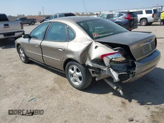 2002 Ford Taurus SES Standard with VIN 1FAFP55U52A156214, listed as a IAAI auction lot 41803668 with 31,693 mi miles. Bid and sale history available at carsss.com. Image 3.