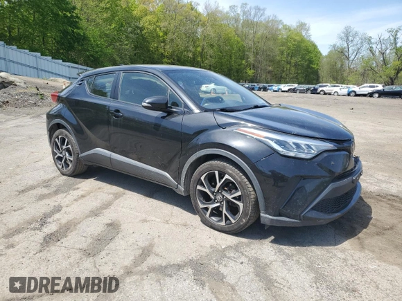 2020 Toyota C-HR LE z VIN JTNKHMBX1L1093317, wystawiony jako Copart lot #55286375 z przebiegiem 115 640 mil mil oraz Szkoda całkowita • Salvage title. Historia ofert i sprzedaży dostępna na DreamBid. Obrazek 4.