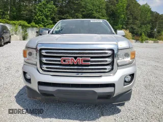 2016 GMC Canyon z VIN 1GTH5CE3XG1372815, wystawiony jako Copart lot #55076495 z przebiegiem 123 485 mil mil oraz Szkoda całkowita • Salvage title. Historia ofert i sprzedaży dostępna na DreamBid. Obrazek 5.
